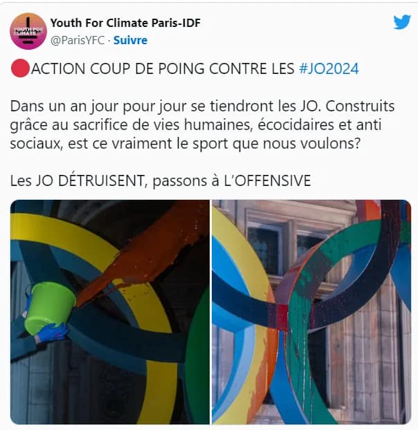 les-anneaux-des-Jeux-devant-la-mairie-de-Paris-asperges-de-faux-sang-par-des-militants-pour-le-climat-de-Youth-for-Climate-pour-denoncer-le-cout-ecologique-des-JO